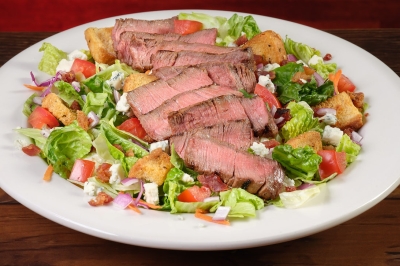 Steakhouse Filet Salad with tender filet medallions and fresh toppings at Texas Roadhouse